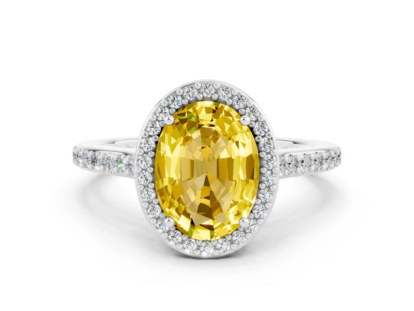 Silver Oval Cut Yellow Sapphire Halo Engagement Ring with Round Pavé Shoulders and Prong Setting