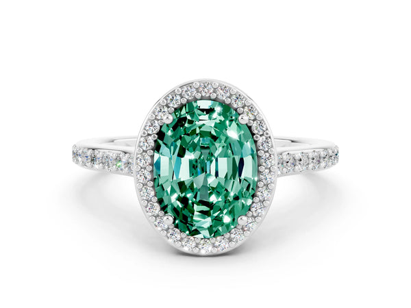 Platinum Oval Cut Green Sapphire Halo Engagement Ring with Round Pavé Shoulders and Prong Setting