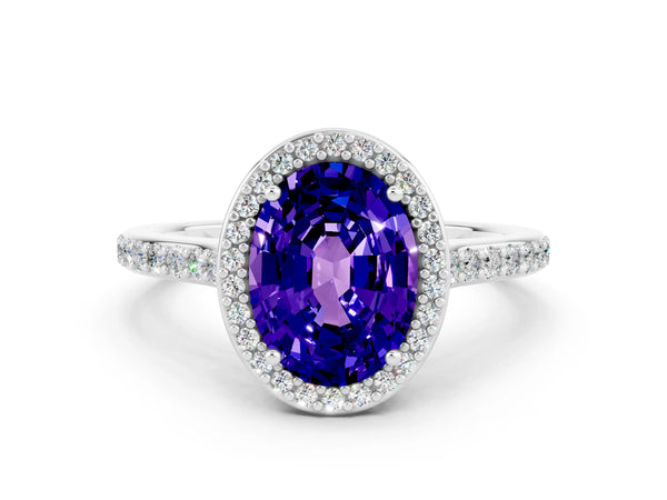 Silver Oval Cut Tanzanite Halo Engagement Ring with Round Pavé Shoulders and Prong Setting