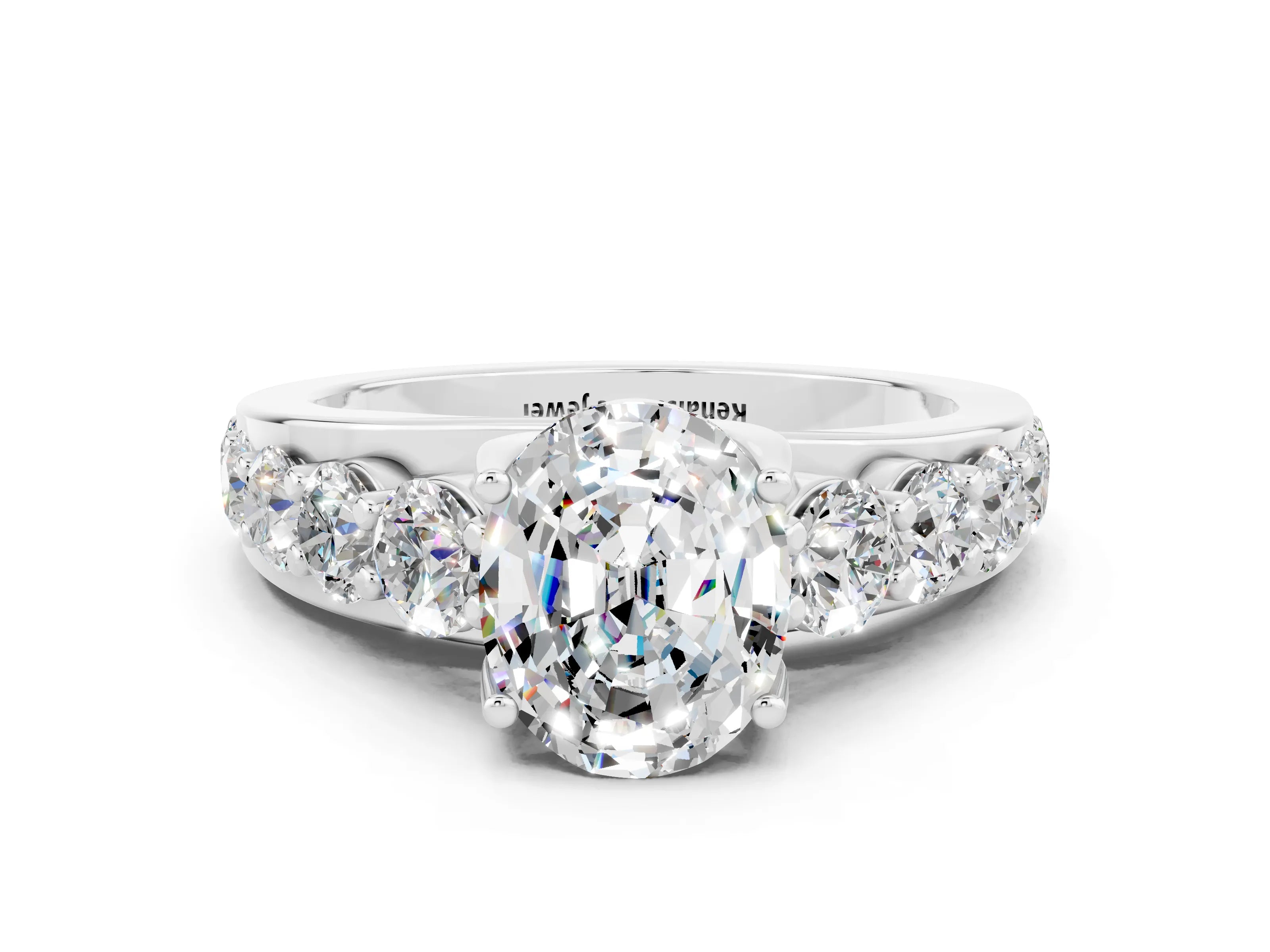 White gold Oval Cut Moissanite Engagement Ring with Pavé Band and Four-Prong Setting