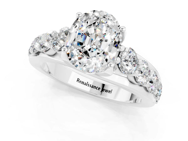 Silver Oval Cut Moissanite Engagement Ring with Pavé Band and Four-Prong Setting