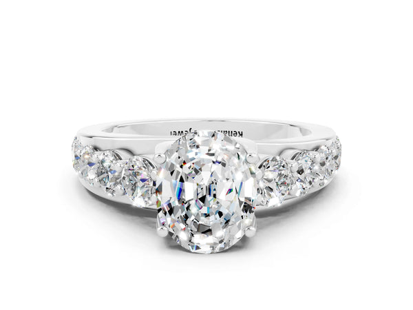 Silver Oval Cut Moissanite Engagement Ring with Pavé Band and Four-Prong Setting
