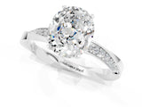 White gold Oval Cut Moissanite Engagement Ring with Side Stone Accents and Four-Prong Setting_97
