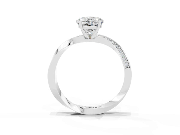 White gold Oval Cut Moissanite Engagement Ring with Side Stone Accents and Four-Prong Setting