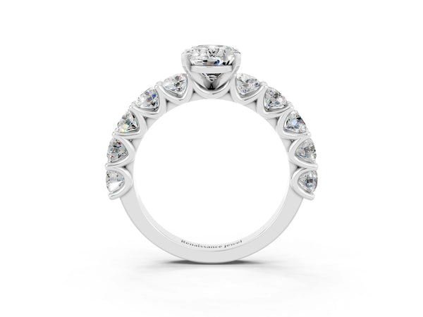 White gold Oval Cut Moissanite Prong Setting with Side Stones on a Pave Band
