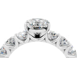 White gold Oval Cut Moissanite Prong Setting with Side Stones on a Pave Band_4