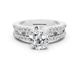 White gold Oval Cut Moissanite Solitaire Ring with Pavé and Channel Set Band