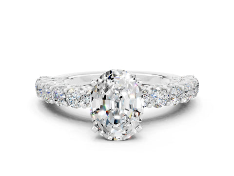 White gold Oval Cut Moissanite Solitaire Ring with Shared Prong Pavé Band and Four-Prong Setting