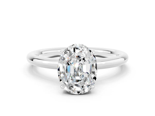 Platinum Oval Cut Moissanite Solitaire Ring with Thin Band and Four-Prong Setting
