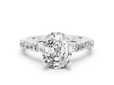 White gold Oval Cut Moissanite Solitaire with Side Baguettes and Channel Set Band