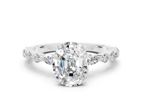 White gold Oval Cut Moissanite Solitaire with Side Stones on a Pavé Band and Four-Prong Setting
