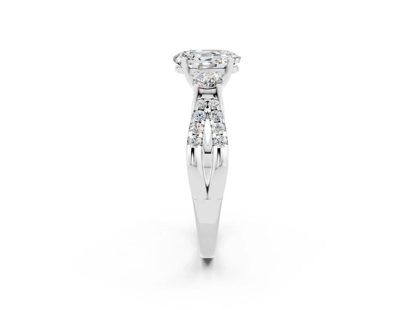 Silver Oval Cut Moissanite Three-Stone Ring with Pavé Split Shank and Four-Prong Setting