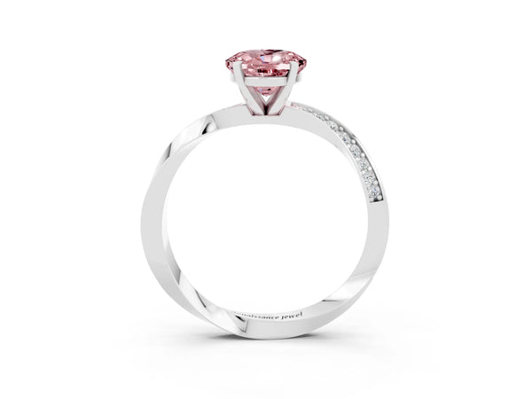 Silver Oval Cut Morganite Engagement Ring with Side Stone Accents and Four-Prong Setting