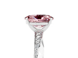 White gold Oval Cut Morganite Engagement Ring with Side Stone Accents and Four-Prong Setting_32