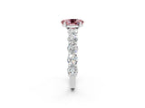 White gold Oval Cut Morganite Prong Setting with Side Stones on a Pave Band_2