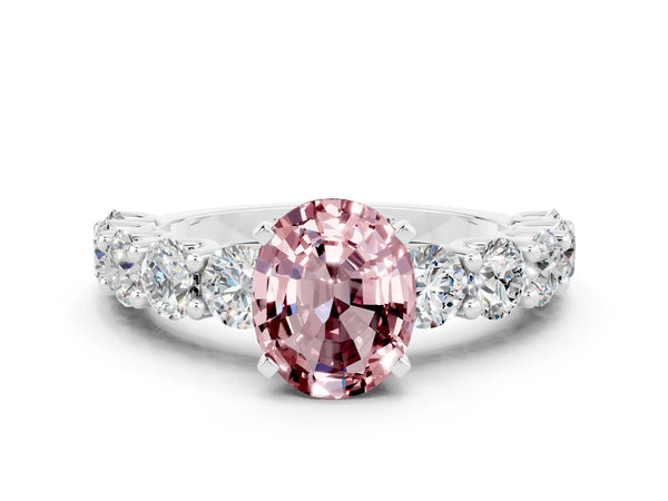 White gold Oval Cut Morganite Prong Setting with Side Stones on a Pave Band