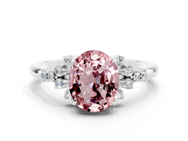 Silver Oval Cut Morganite Ring with Side Stones and Four-Prong Setting
