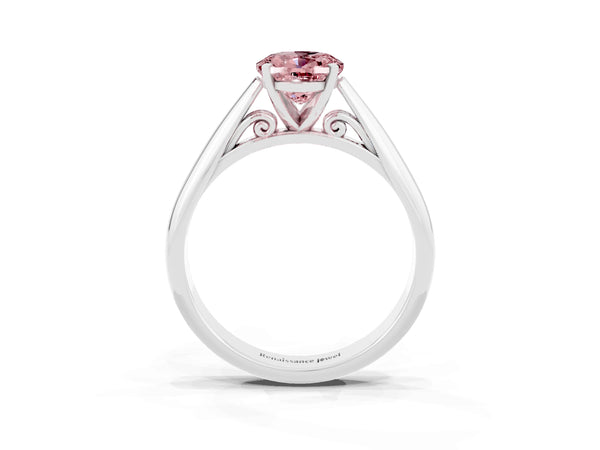 Platinum Oval Cut Morganite Solitaire Engagement Ring with Cathedral Setting and Four-Prong Mount