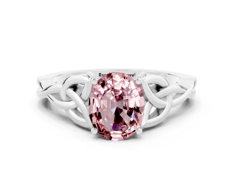 White gold Oval Cut Morganite Solitaire Engagement Ring with Celtic Knot Band and Four-Prong Setting