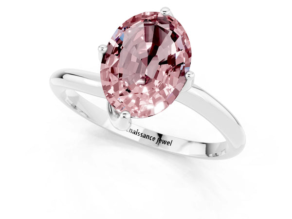 Silver Oval Cut Morganite Solitaire Engagement Ring with Four-Prong Setting and Classic Band