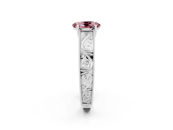 Silver Oval Cut Morganite Solitaire Ring with Engraved Band and Four-Prong Setting