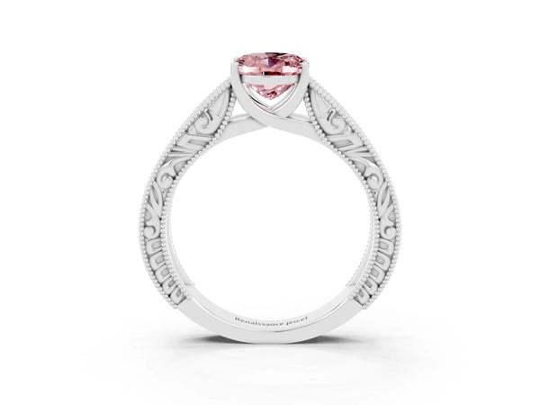 Platinum Oval Cut Morganite Solitaire Ring with Engraved Band and Four-Prong Setting