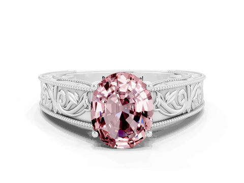 White gold Oval Cut Morganite Solitaire Ring with Engraved Band and Four-Prong Setting