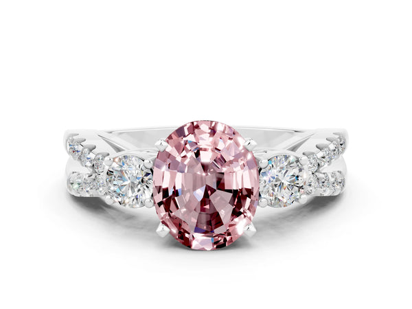 Platinum Oval Cut Morganite Three-Stone Ring with Pavé Split Shank and Four-Prong Setting