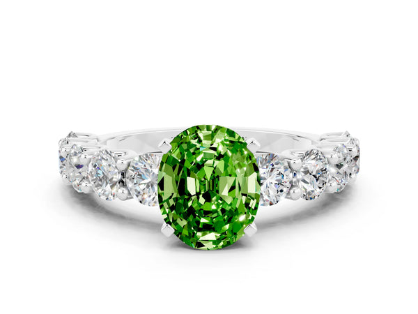 Silver Oval Cut Peridot Prong Setting with Side Stones on a Pave Band