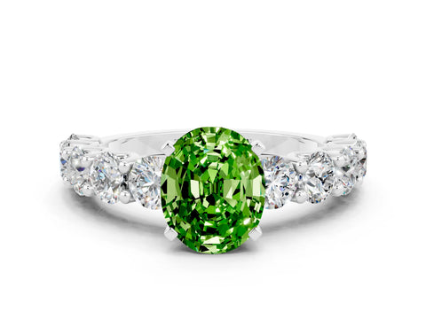 White gold Oval Cut Peridot Prong Setting with Side Stones on a Pave Band