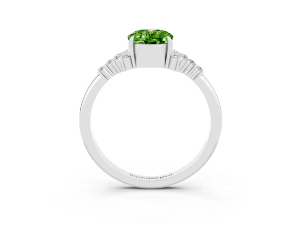 Silver Oval Cut Peridot Ring with Side Stones and Four-Prong Setting