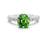 White gold Oval Cut Peridot Side Stone Solitaire Ring with Round  and Four-Prong Setting_48