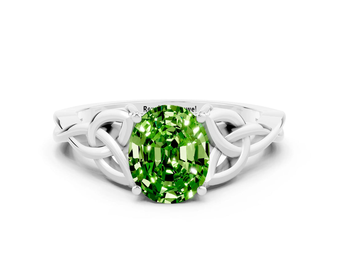 White gold Oval Cut Peridot Solitaire Engagement Ring with Celtic Knot Band and Four-Prong Setting