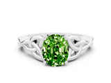 White gold Oval Cut Peridot Solitaire Engagement Ring with Celtic Knot Band and Four-Prong Setting