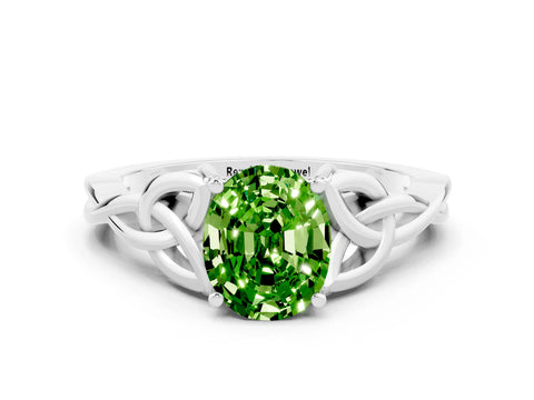 White gold Oval Cut Peridot Solitaire Engagement Ring with Celtic Knot Band and Four-Prong Setting