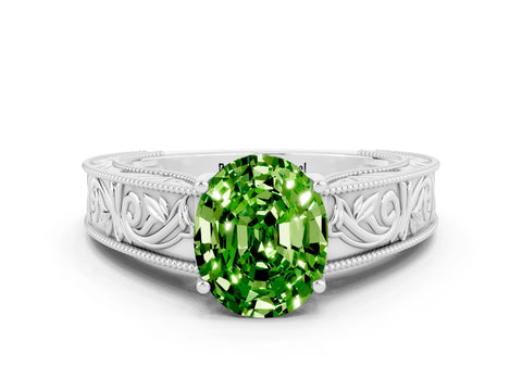 White gold Oval Cut Peridot Solitaire Ring with Engraved Band and Four-Prong Setting