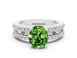 White gold Oval Cut Peridot Solitaire Ring with Pavé and Channel Set Band