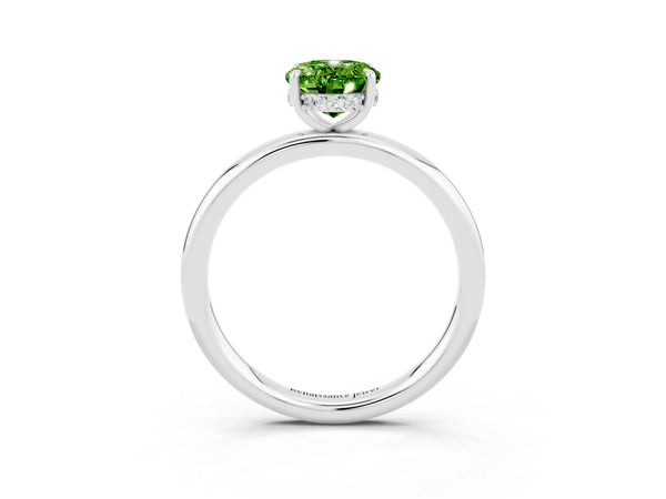 Platinum Oval Cut Peridot Solitaire Ring with Thin Band and Four-Prong Setting