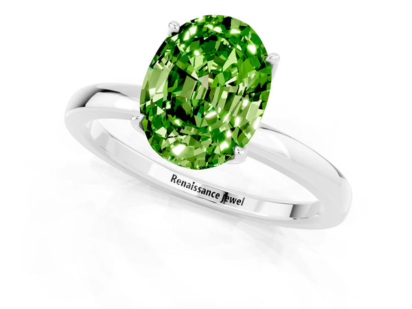 Platinum Oval Cut Peridot Solitaire Ring with Thin Band and Prong Setting