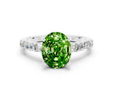 White gold Oval Cut Peridot Solitaire with Side Baguettes and Channel Set Band