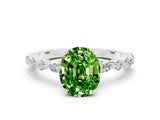 White gold Oval Cut Peridot Solitaire with Side Stones on a Pavé Band and Four-Prong Setting