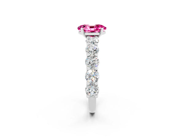 White gold Oval Cut Pink Sapphire Prong Setting with Side Stones on a Pave Band
