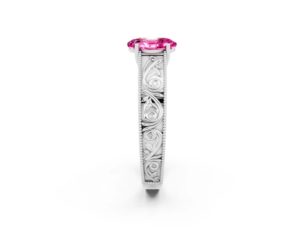 White gold Oval Cut Pink Sapphire Solitaire Ring with Engraved Band and Four-Prong Setting