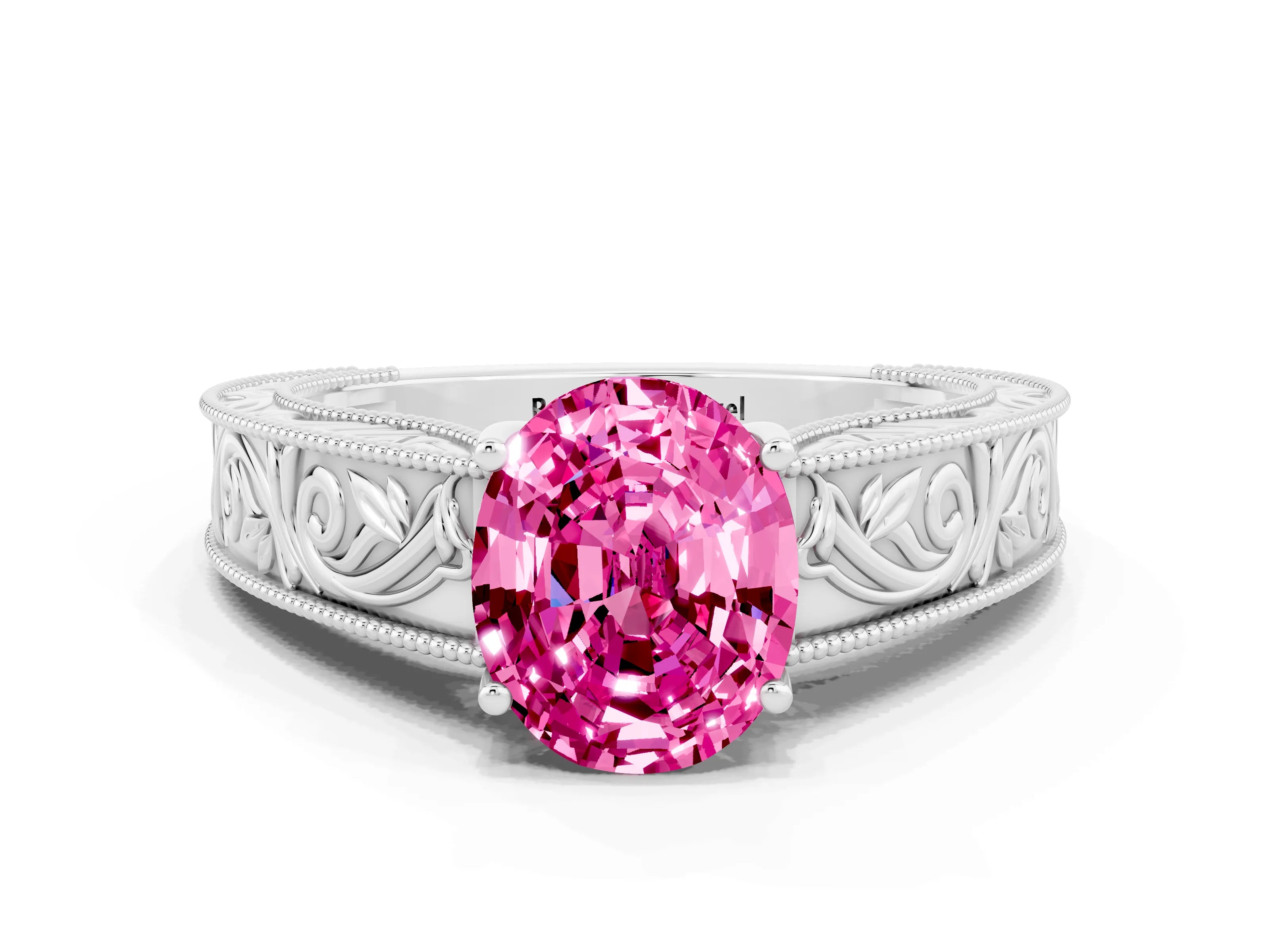 White gold Oval Cut Pink Sapphire Solitaire Ring with Engraved Band and Four-Prong Setting