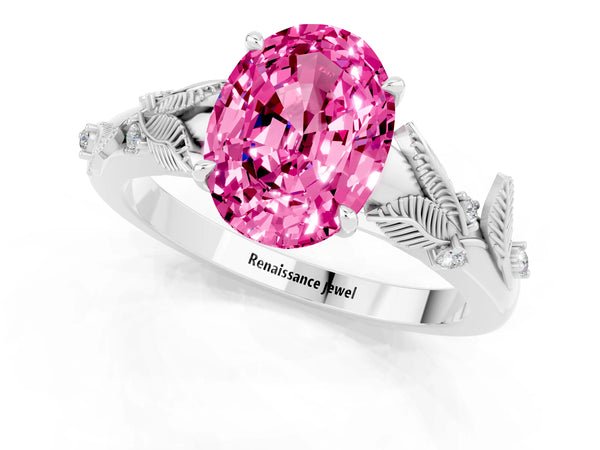 Silver Oval Cut Pink Sapphire Solitaire Ring with Leaf Motif Band and Four-Prong Setting