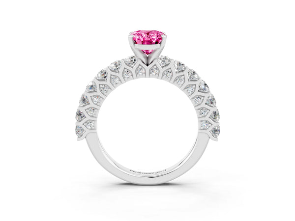 White gold Oval Cut Pink Sapphire Solitaire Ring with Shared Prong Pavé Band and Four-Prong Setting
