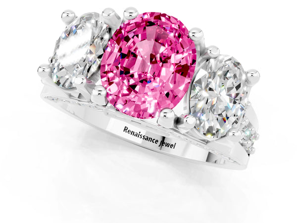White gold Oval Cut Pink Sapphire Three-Stone Ring with Channel Set Band and Four-Prong Setting