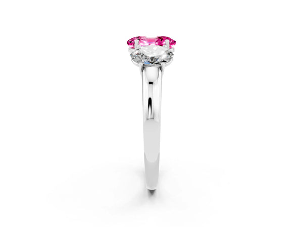 Platinum Oval Cut Pink Sapphire Three-Stone Ring with Four-Prong Setting and Classic Band