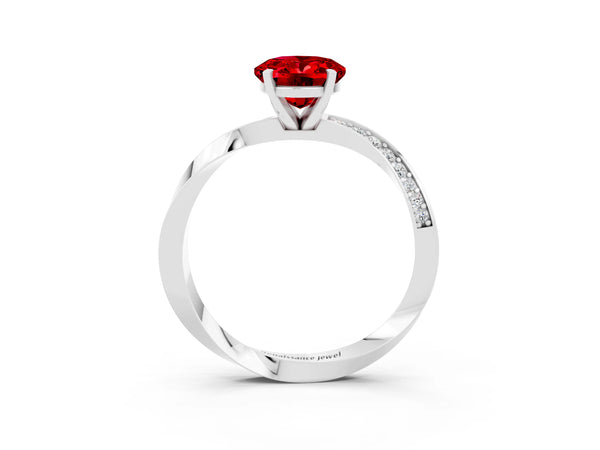 White gold Oval Cut Ruby Engagement Ring with Side Stone Accents and Four-Prong Setting