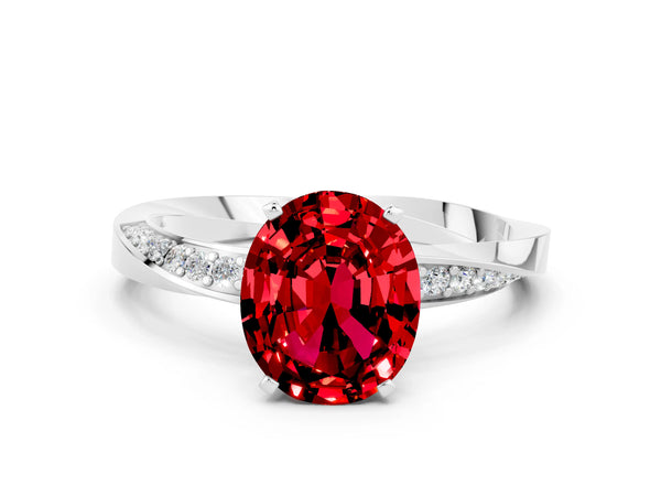 White gold Oval Cut Ruby Engagement Ring with Side Stone Accents and Four-Prong Setting